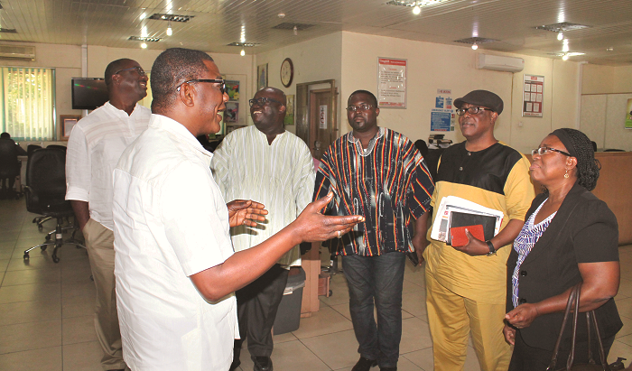  Mr Kobby Asmah (left), Political Editor of Daily Graphic, in a chat with Mr Kwasi Gyan-Apenteng (2nd right), Chairman of the NMC, Mr Richard Quashigah (3rd right) and Dr Perpetua Dadzie (right). Also in the picture are Mr Kenneth Ashigbey (3rd left), MD, GCGL, and Mr Samuel Atta Mensah.  Pictures: Maxwell Ocloo 
